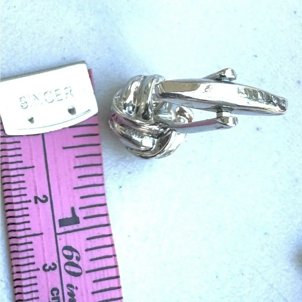 Silver tone knot cuff links